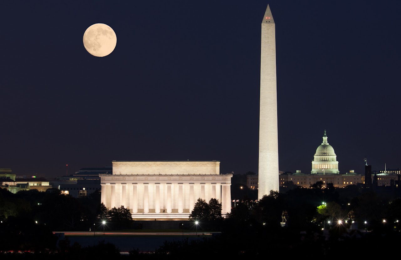 DC nightime with full moon, Lincoln Memorial, Washington Monument, and U.S. Capitol Building.