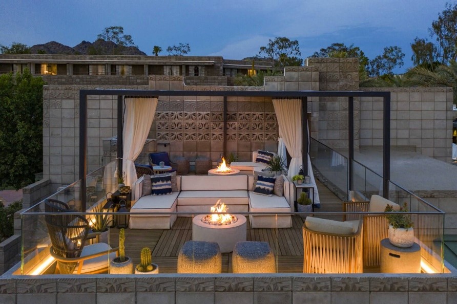 Cabana with fire place in the evening light.