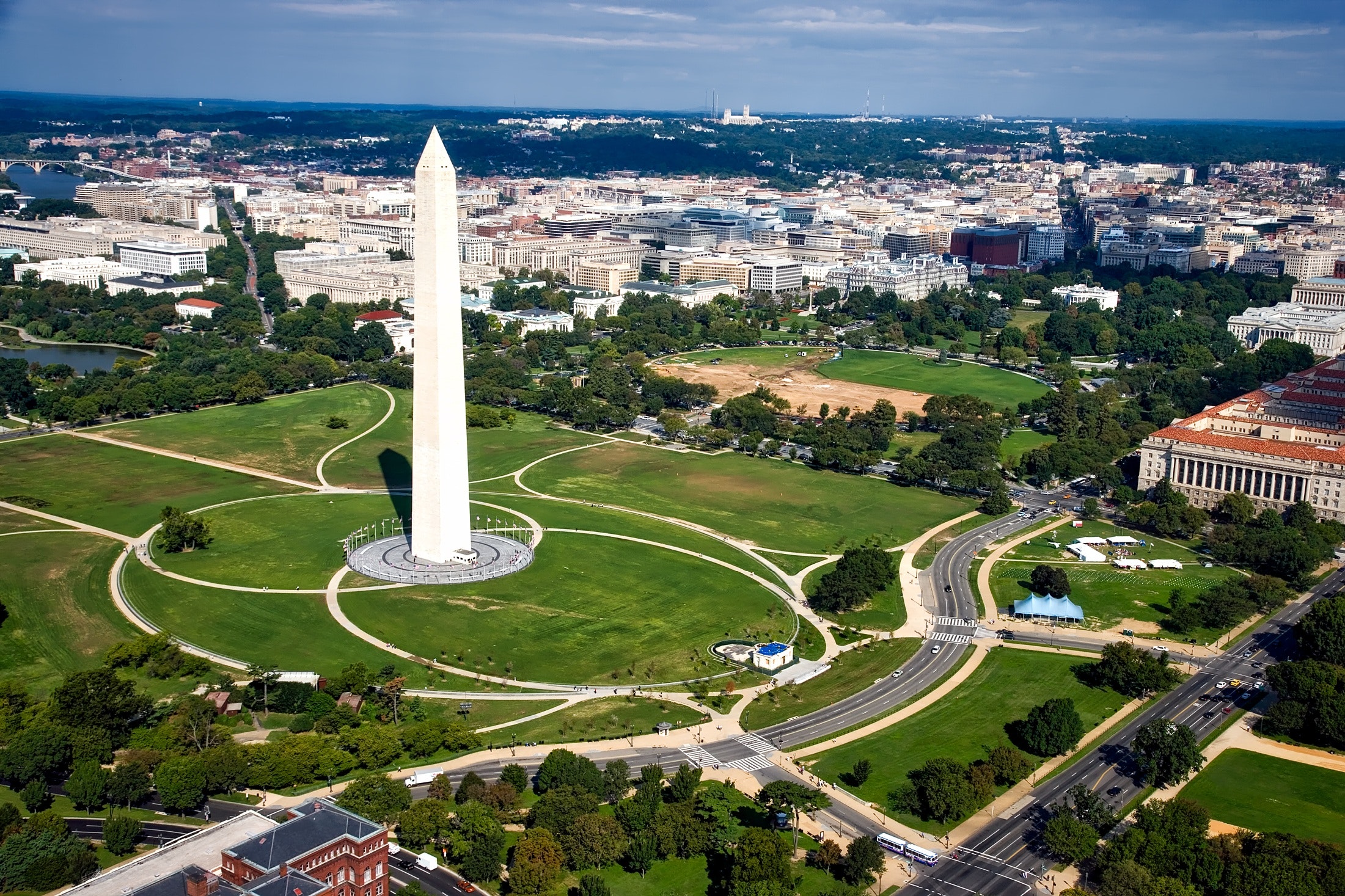 Aerial view of Washington Monument on a sunny day with blue skies